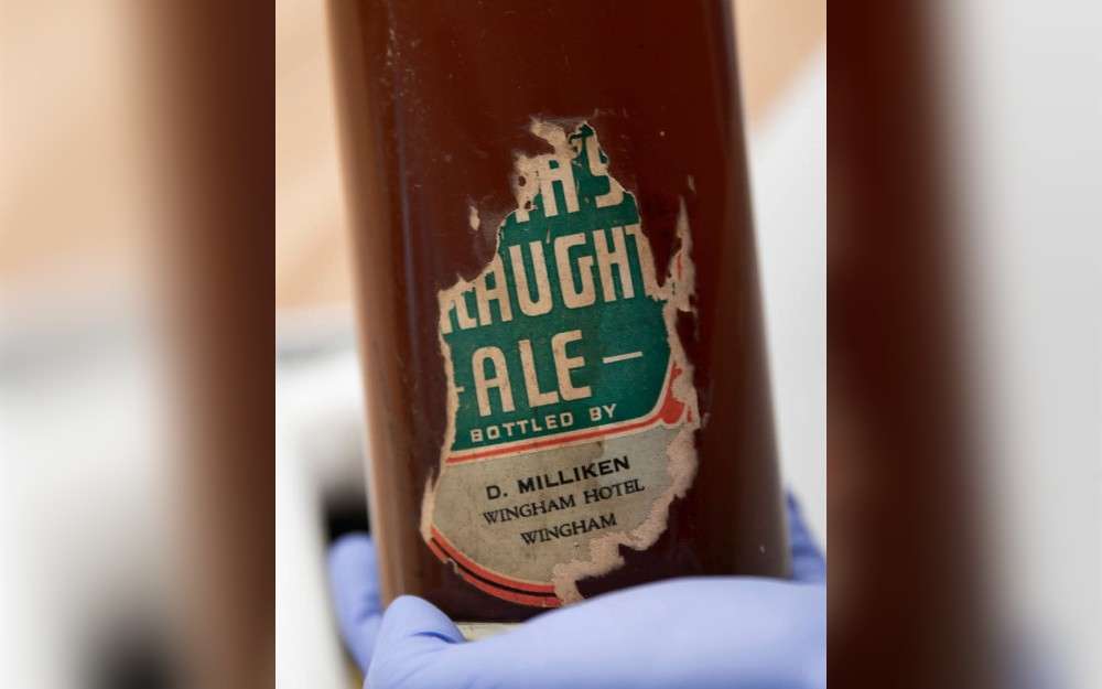 Recently, the Australian War Memorial, Canberra received a donation of one of Australia's oldest unopened beer bottles.During their time at the Wingham Hotel, friends Stanley (Stan) Lewis and Frederick (Fred) Hume purchased this bottle of Tooth's Draught Ale with the intention of sharing it upon their return from the Second World War.
