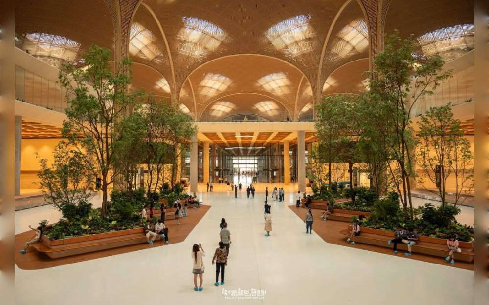 Passenger flights began on Tuesday at a $2 billion Chinese-built airport near Phnom Penh that Cambodian officials hope will boost the country’s sagging tourism industry.