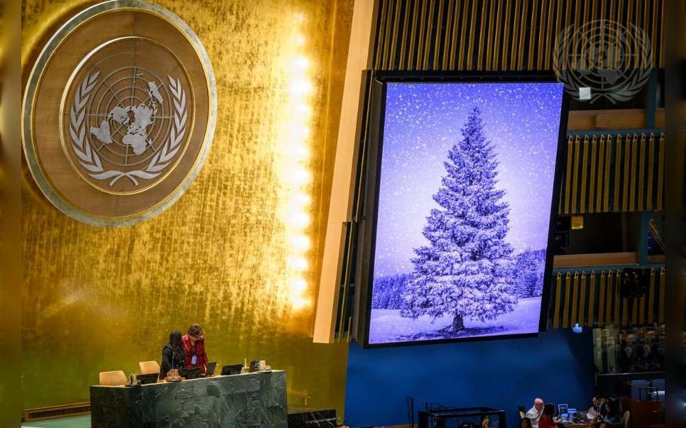 A view of the screen prior to the resumed United Nations General Assembly 69th plenary meeting on the Report of the Fifth Committee.